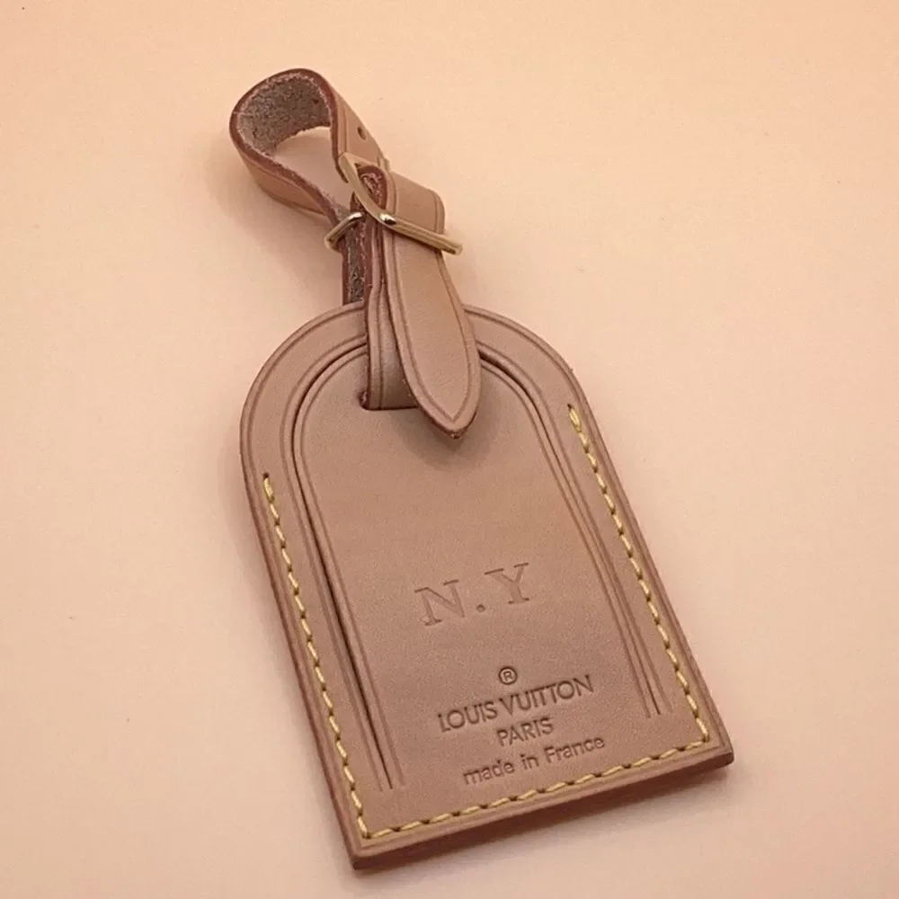 ❤️authentic lv tag with NY initials only flaw.